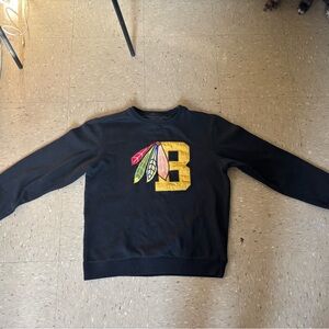 Black Pyramid Crewneck Sweater with Yellow and Multicolor Design